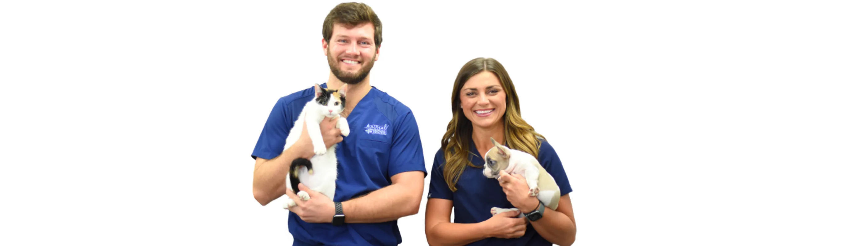 Animal Medical Center's staff holding animals.